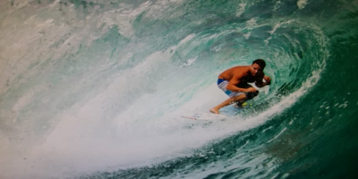 Ryan Ragan surfing